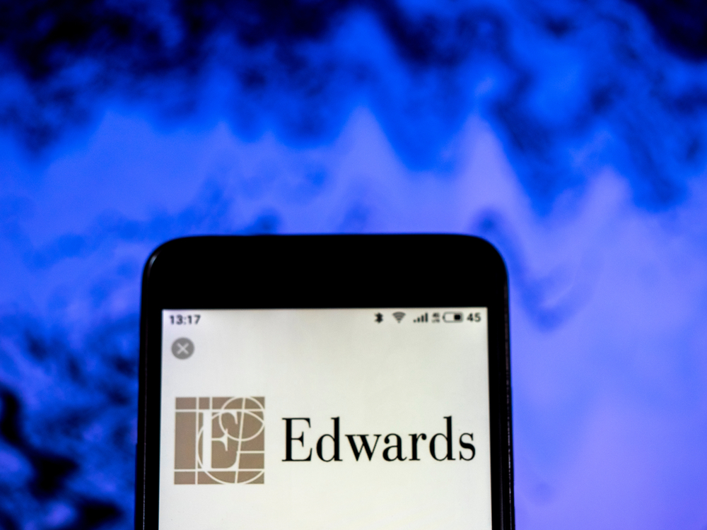 Healthcare (names A - H) - Edwards Lifesciences Corp logo on phone- by IgorGolovniov via Shutterstock