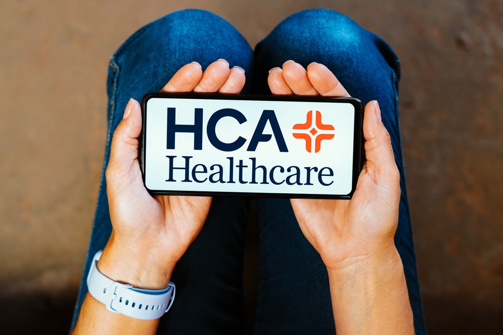 Healthcare (names A - H) - HCA Healthcare Inc logo on phone-by rafapress via Shutterstock