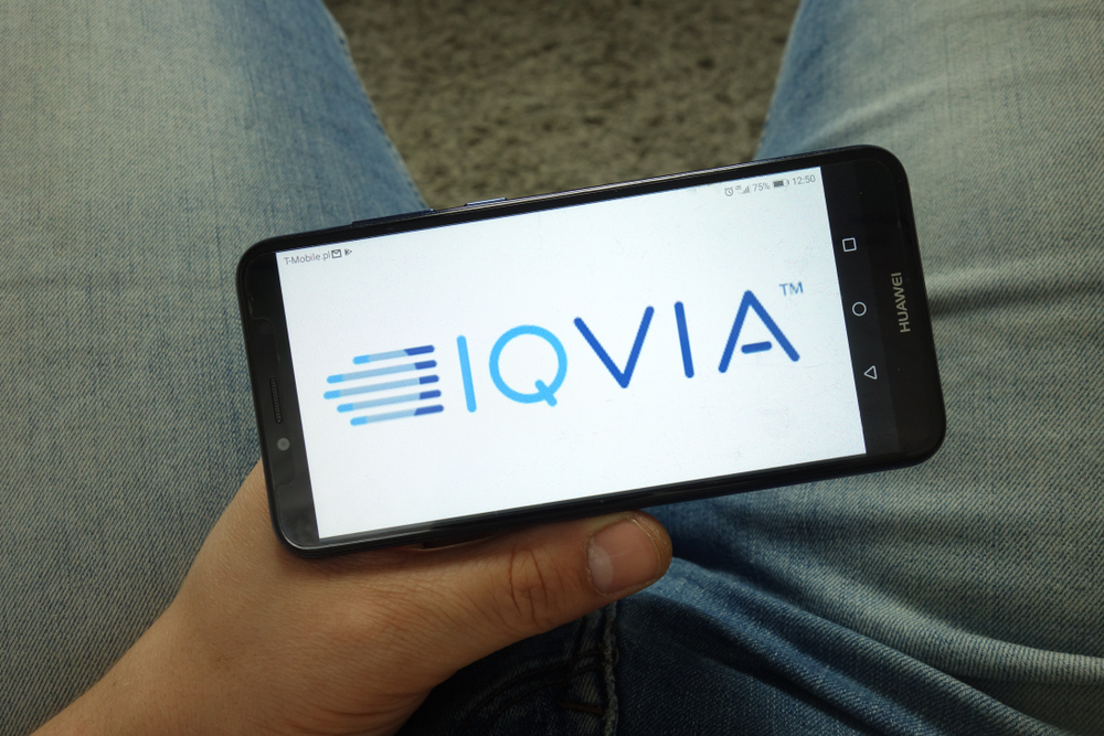 Healthcare (names I - Z) - IQVIA Holdings Inc logo on phone-by Piotr Swat via Shutterstock