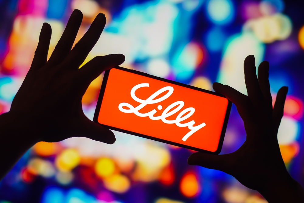 Healthcare (names I - Z) - Lilly(Eli) & Co logo on phone-by rafapress via Shutterstock