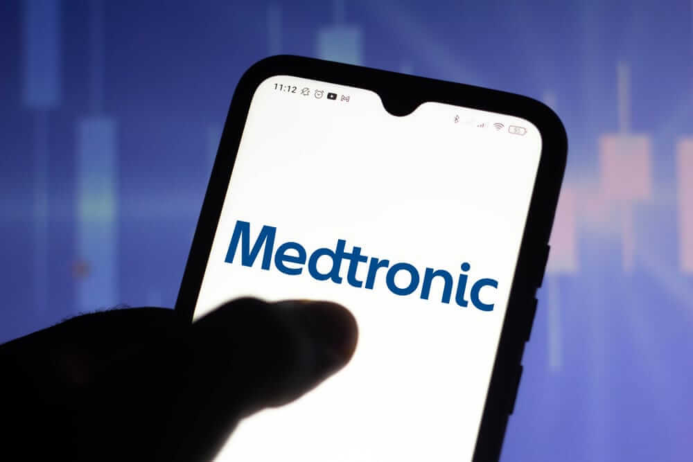Medtronic Plc logo on phone-by rafapress via Shutterstock