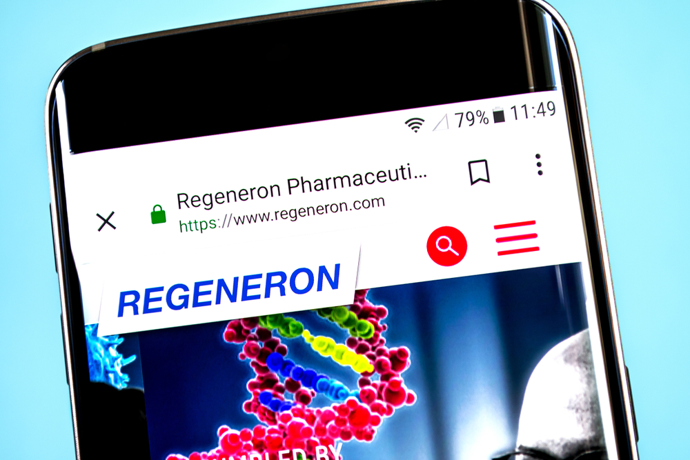 Healthcare (names I - Z) - Regeneron Pharmaceuticals, Inc_ website on phone-by madamF via Shutterstock