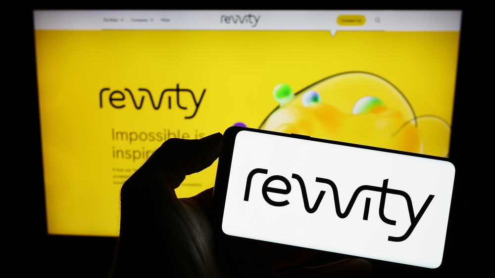 Healthcare (names I - Z) - Revvity Inc_ logo on phone and site by- T_Schneier via Shutterstock