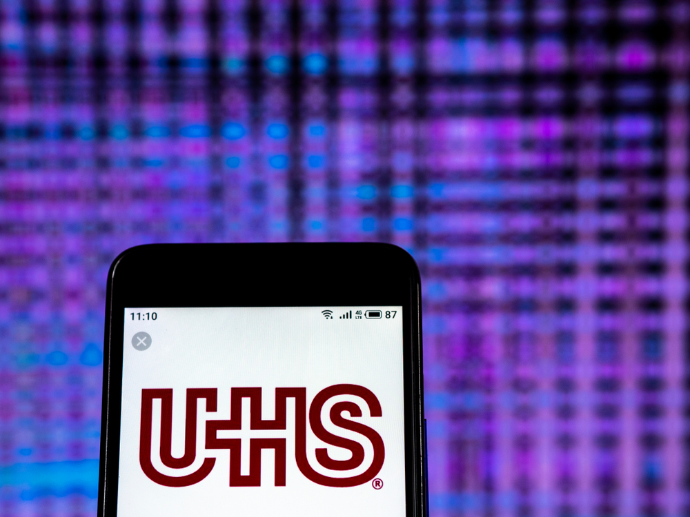 Healthcare (names I - Z) - Universal Health Services, Inc_ logo on phone-by IgorGolovniov via Shutterstock