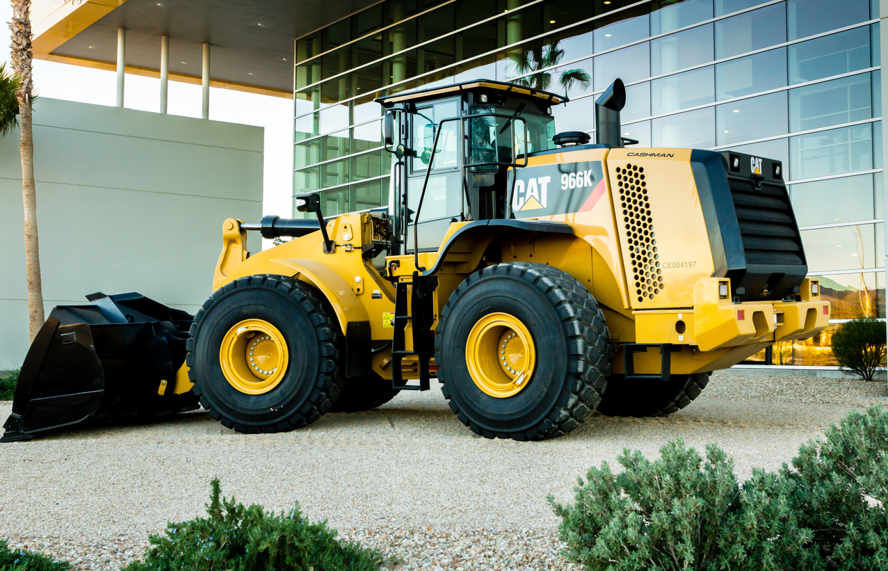 Industrials (names A - I) - Caterpillar Inc_ front loader-by Woodkern via iStock