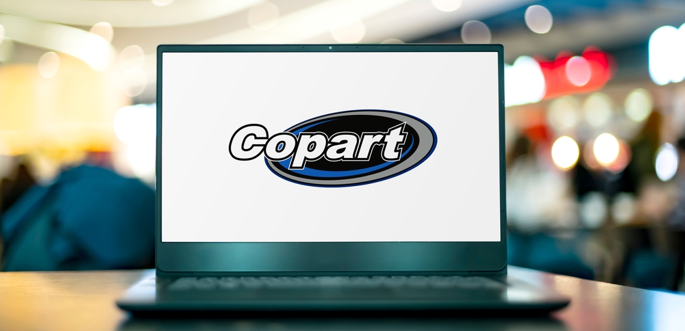 Copart, Inc logo on website -by monticello via Shutterstock