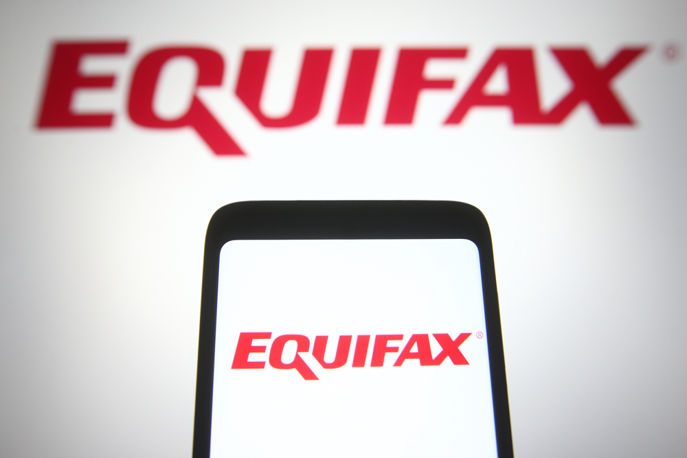 Industrials (names A - I) - Equifax, Inc_ logo on phone-by viewimage via Shutterstock