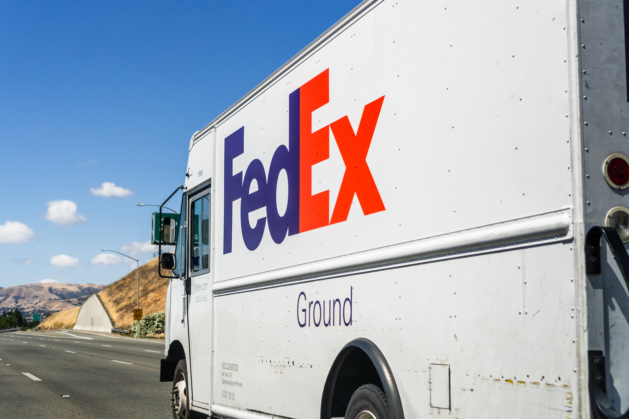 Industrials (names A - I) - Fedex Corp delivery truck-by Sundry Photography via iStock