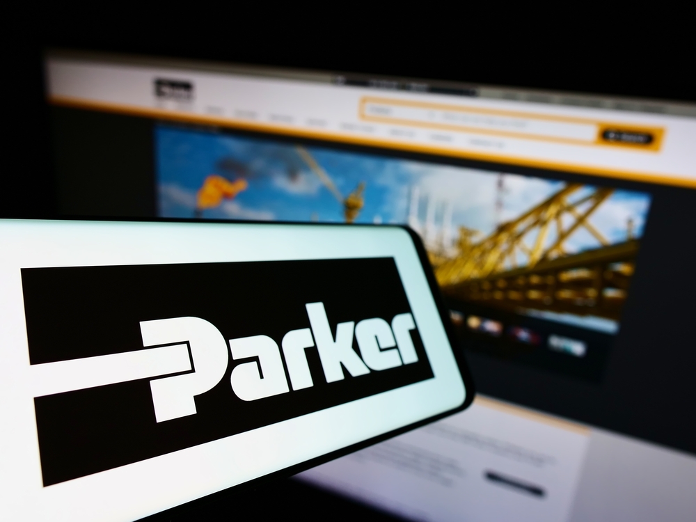 Industrials (names J - Z) - Parker-Hannifin Corp_ logo on phone and site-by T_Schneider via Shutterstock