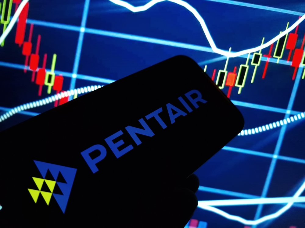 Pentair plc logo and stock chart-by Piotr Swat via Shutterstock