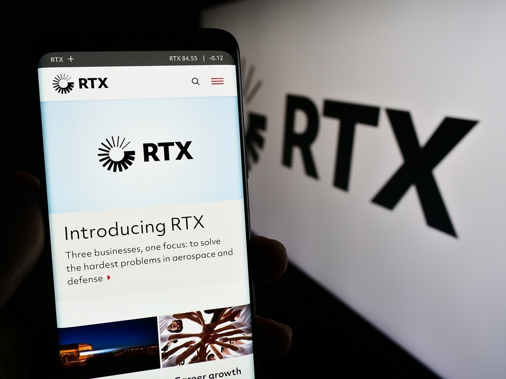 Industrials (names J - Z) - RTX Corp website on phone and logo-by T_Schneider via Shutterstock