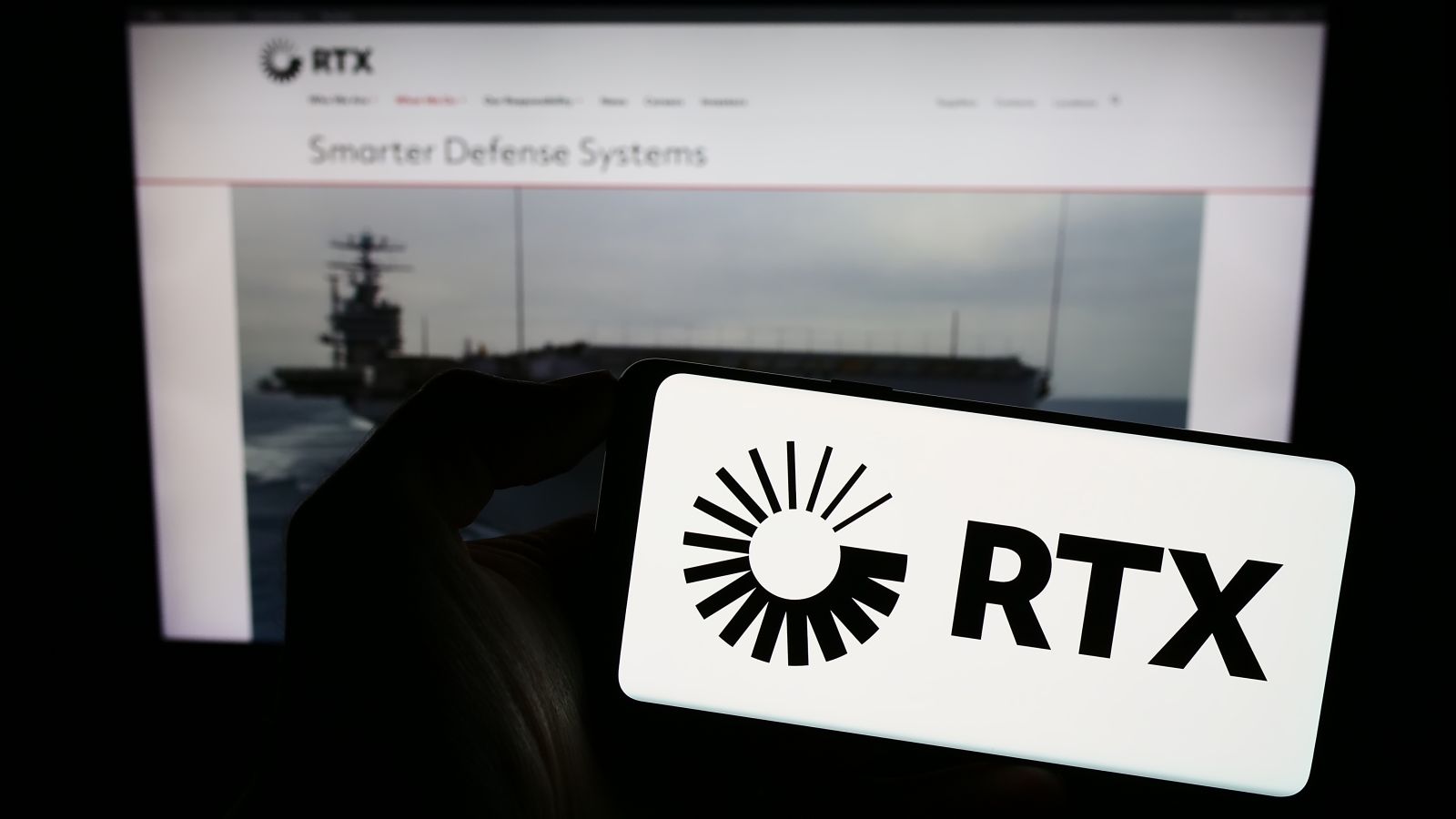 RTX Corporation on screen in front of web page_ By Timon