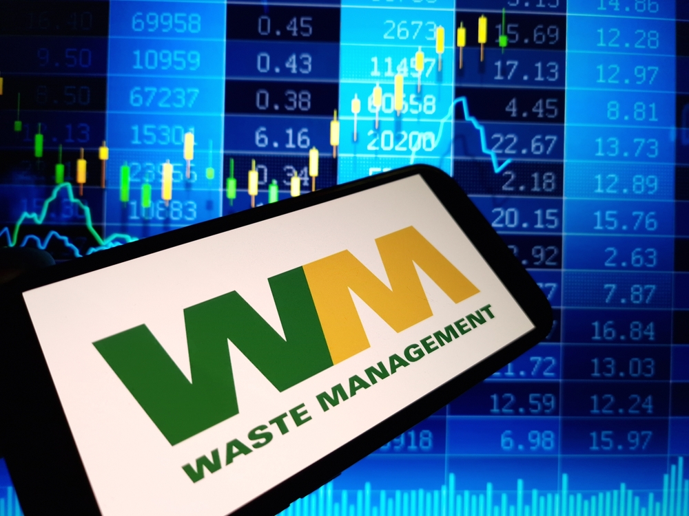 Industrials (names J - Z) - Waste Management, Inc_ logo and chart data-by Piotr Swat via Shutterstock