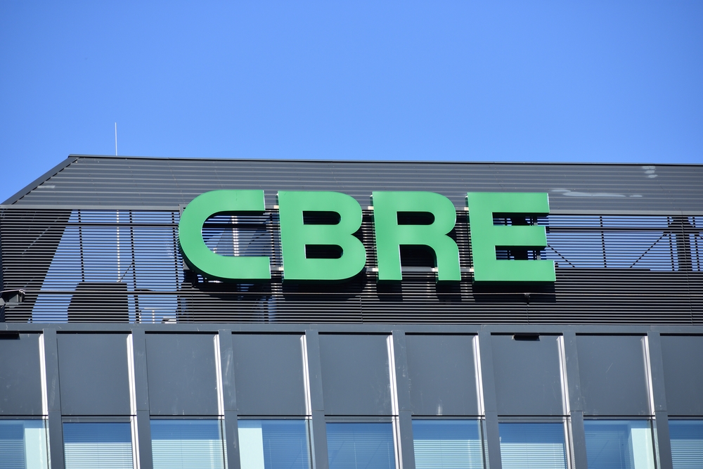 Real Estate - CBRE Group Inc logo on building-by OleksSH via Shutterstock