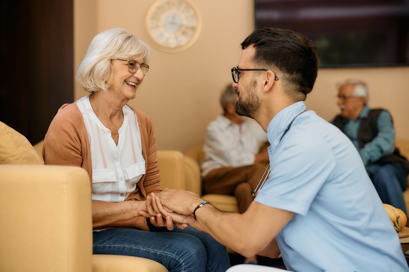 Caregiver and senior woman at residential care home by Drazen via Adobe Stock