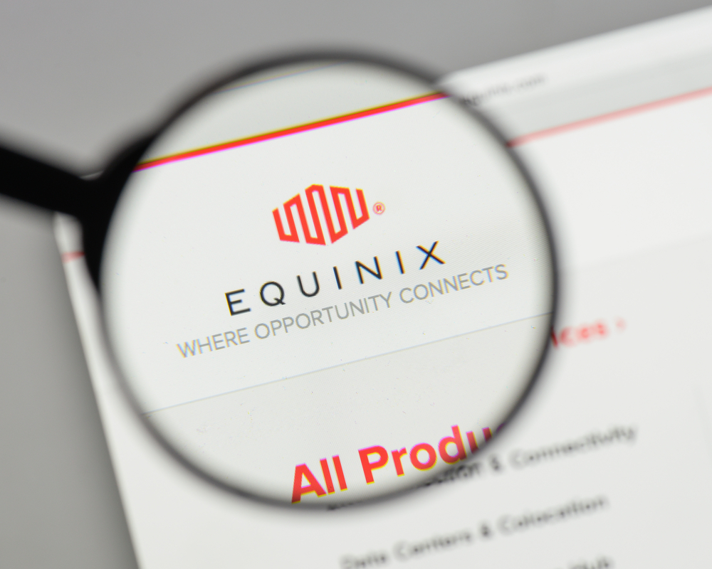 Real Estate - Equinix Inc logo magnified-by Casimiro PT via Shutterstock