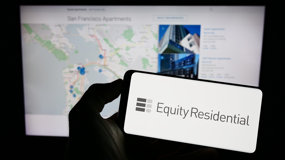 Real Estate - Equity Residential Properties Trust logo on phone and website-by T_Schneider via Shutterstock