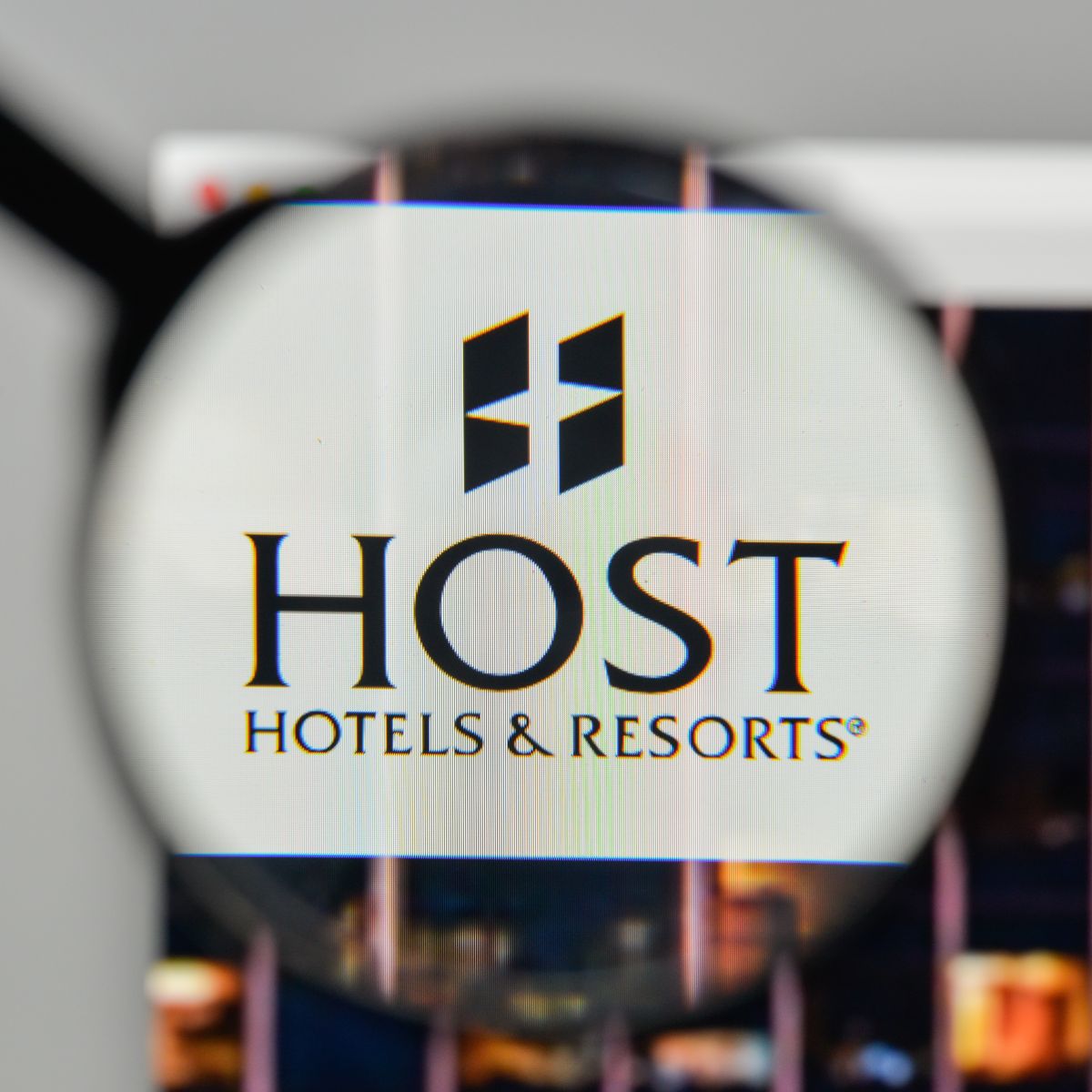 Real Estate - Host Hotels & Resorts Inc logo magnified-by Casimiro PT via Shutterstock