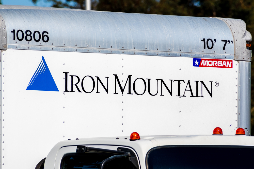 Real Estate - Iron Mountain Inc_ logo on truck-by Sundry Photography via Shutterstock