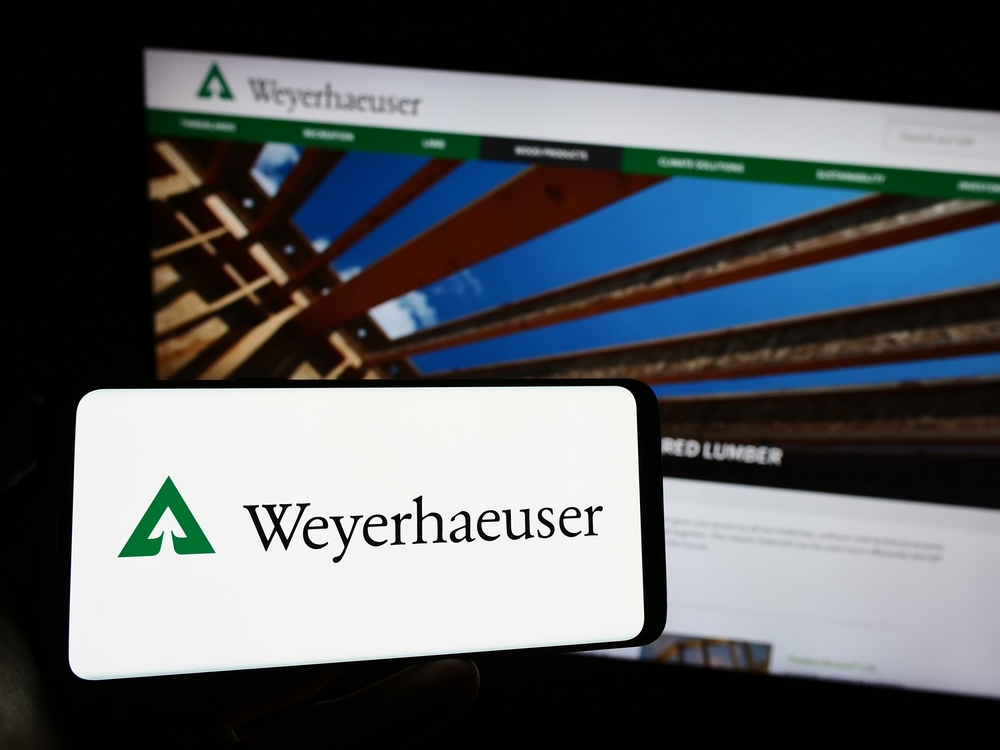 Real Estate - Weyerhaeuser Co_ logo on phone and website-by T_Schneider via Shutterstock