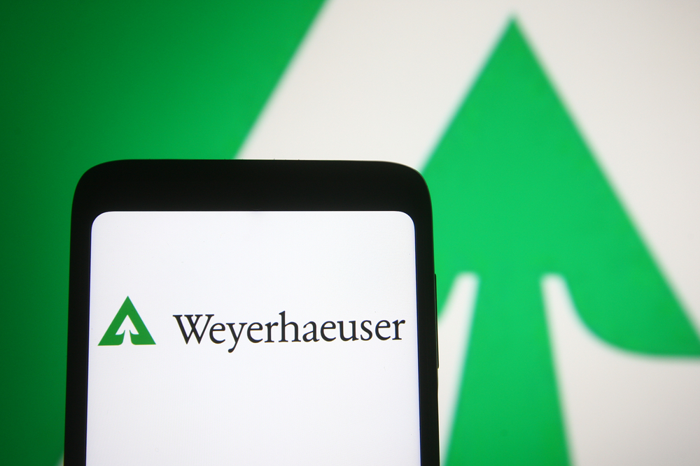 Real Estate - Weyerhaeuser Co_ logo on phone-by viewimage via Shutterstock