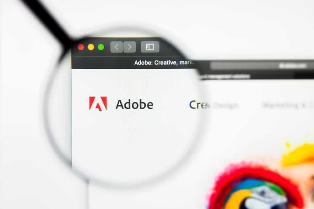 Adobe Inc site magnified- by Pavel Kapysh via Shutterstock