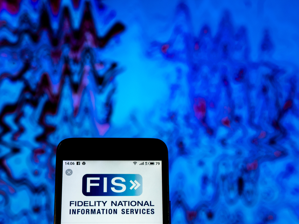 Technology (names A - I) - Fidelity National Information Services, Inc_ website on phone-by IgorGolovniov via Shutterstock