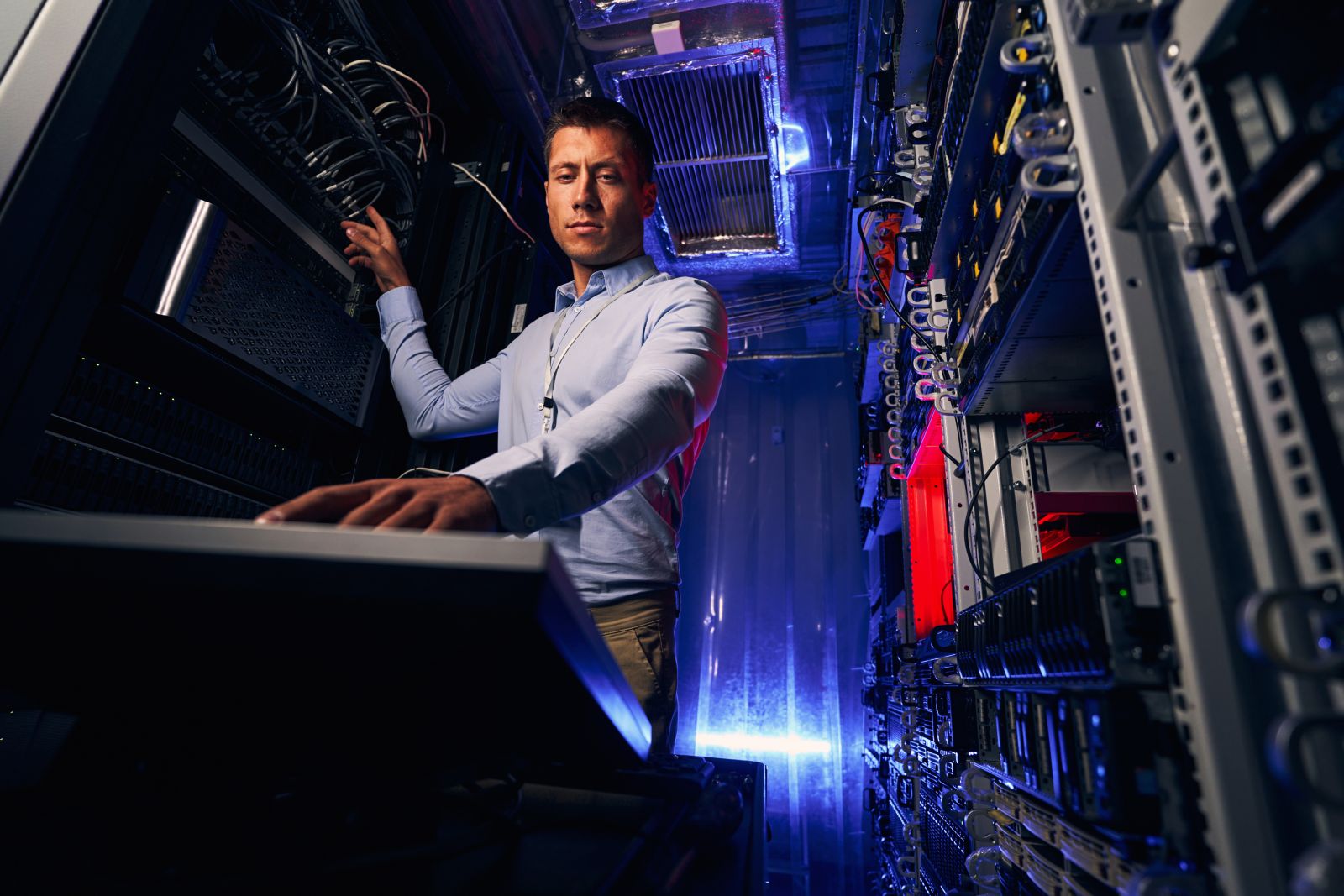 Engineer installing operating system on server by Svitlana via Adobe Stock