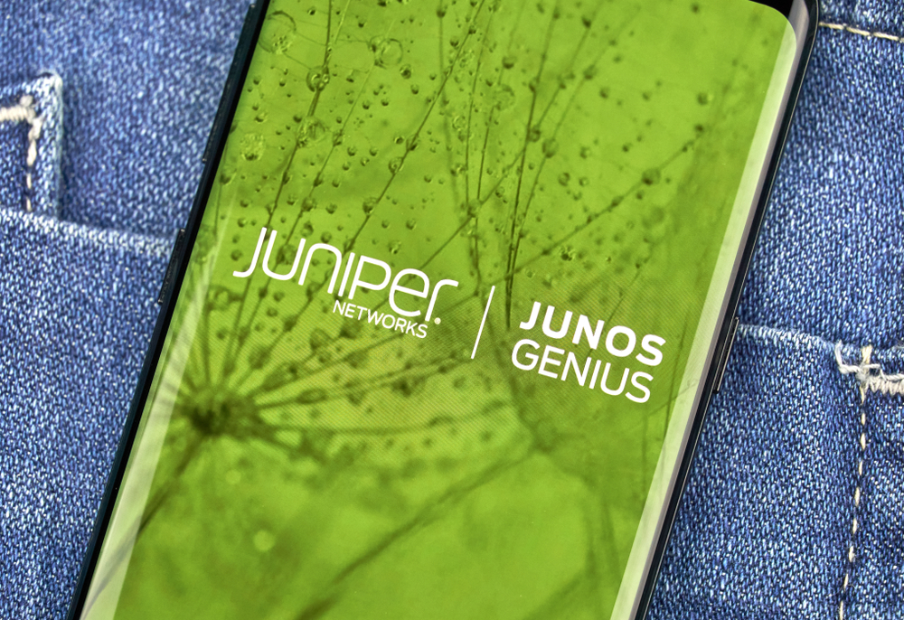 Technology (names J - Z) - Juniper Networks Inc logo on phone-by dennizn via Shutterstock