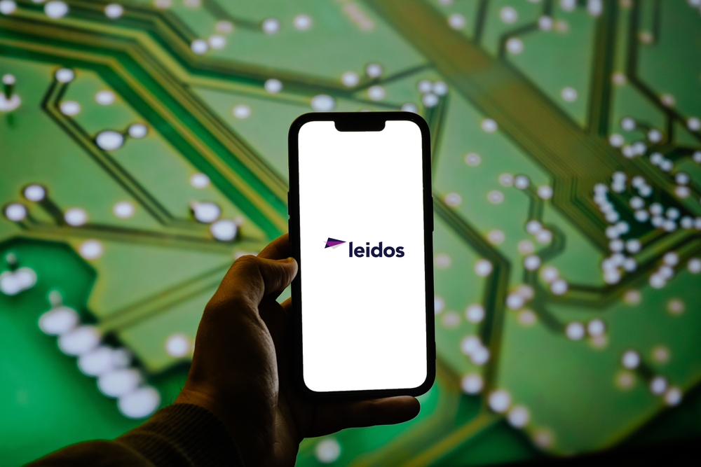 Technology (names J - Z) - Leidos Holdings Inc logo on smartphone-by Photo For Everything via Shutterstock