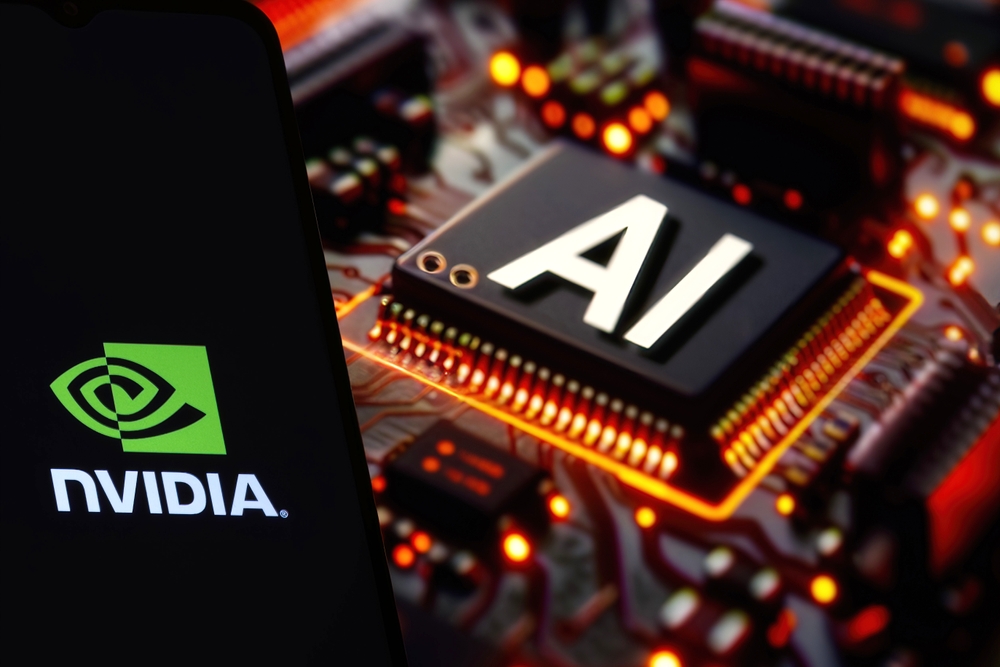 Technology (names J - Z) - NVIDIA Corp logo on phone and AI chip-by Below the Sky via Shutterstock
