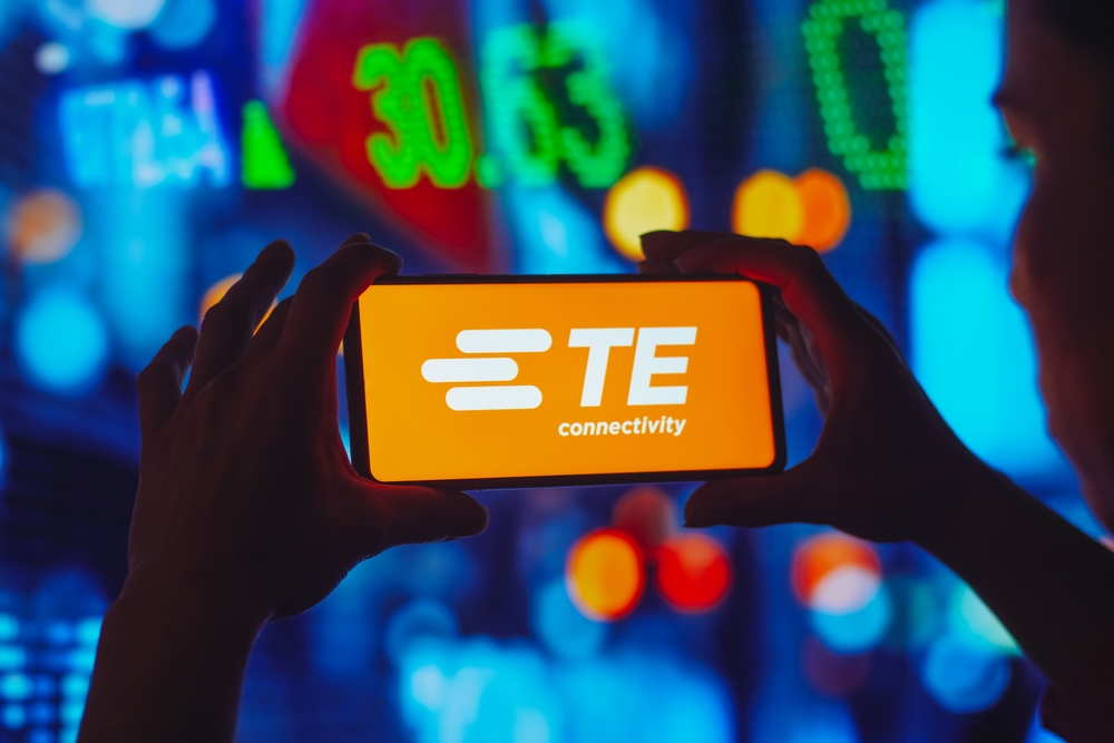 Technology (names J - Z) - TE Connectivity Ltd logo on phone-by rafapress via Shutterstock