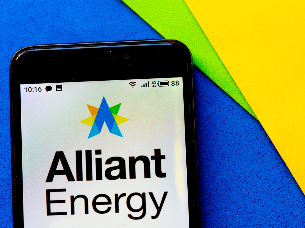 Alliant Energy Corp_ logo on phone-by IgorGolovniov via Shutterstock