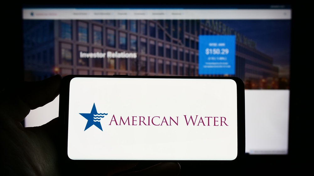 Utilities - American Water Works Co_ Inc_ logo on phone and website-by T_Schneider via Shutterstock