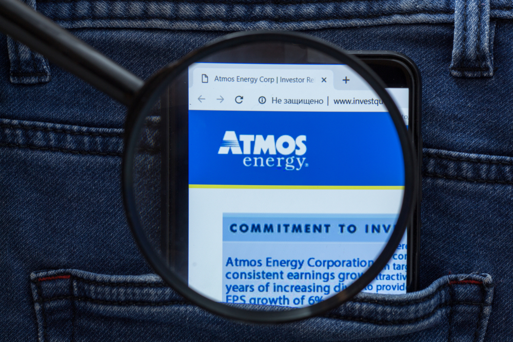 Utilities - Atmos Energy Corp_ logo magnified-by Fenixx666 via Shutterstock