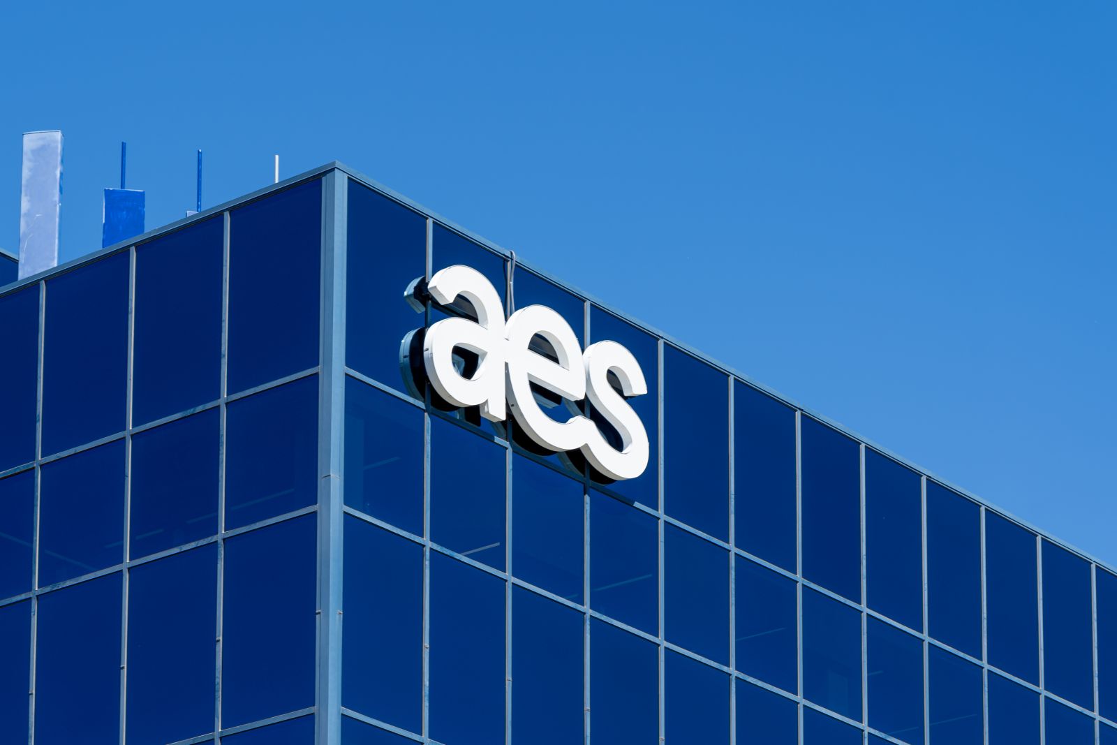 Close up of AES sign on the building at AES’s US clean energy business headquarters in Salt lake City, UT, USA, June 26, 2023_ AES is a clean energy developer_ See Less
