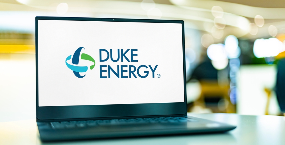 Utilities - Duke Energy Corp_ logo on laptop-by monticello via Shutterstock