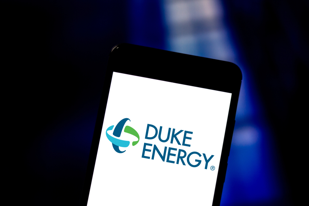 Utilities - Duke Energy Corp_ logo on phone-by rafapress via Shutterstock