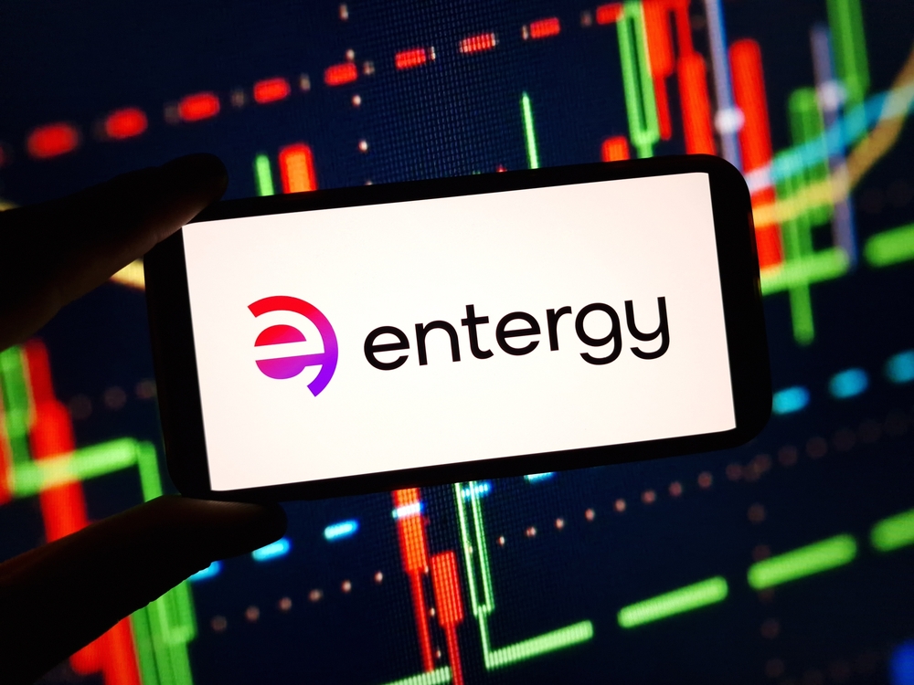 Utilities - Entergy Corp_ logo on phone-by Piotr Swat via Shutterstock