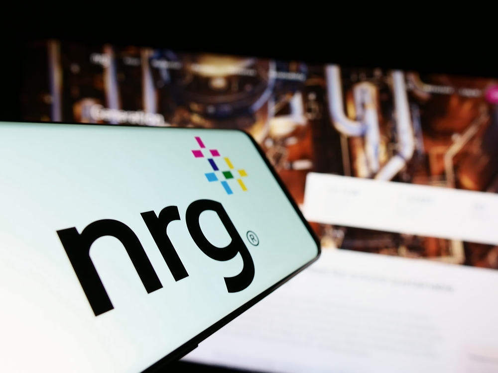 Utilities - NRG Energy Inc_ logo on phone and website-by T_Schneider via Shutterstock