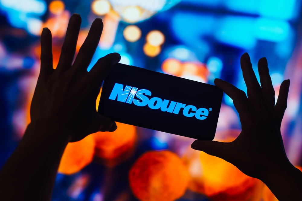 Utilities - NiSource Inc logo on phone-by rafapress via Shutterstock