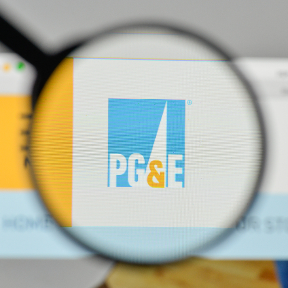 Utilities - PG&E Corp_ logo magnified by-madamF via Shutterstock