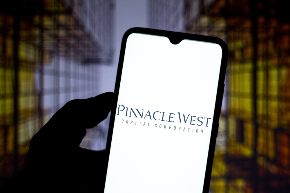 Utilities - Pinnacle West Capital Corp_ logo on phone-by rafapress via Shutterstock