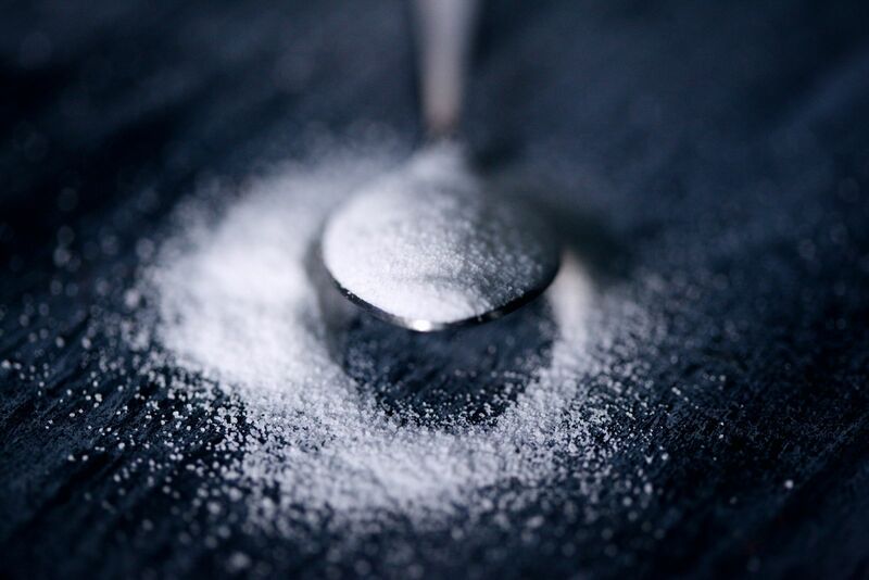 Sugar - spoon full of granular sugar
