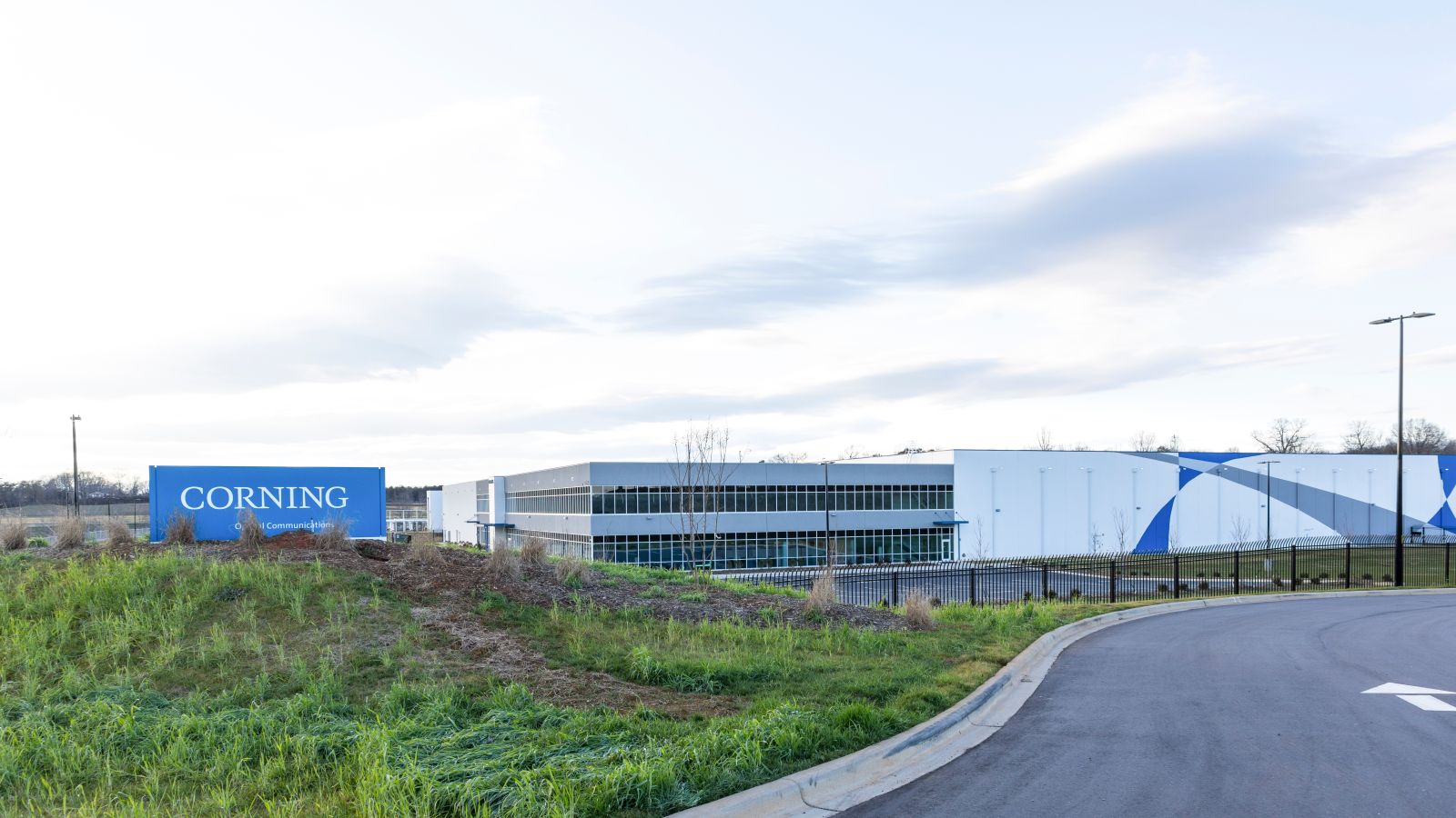 The front of a Corning corporate office by J_ Michael Jones via Adobe Stock