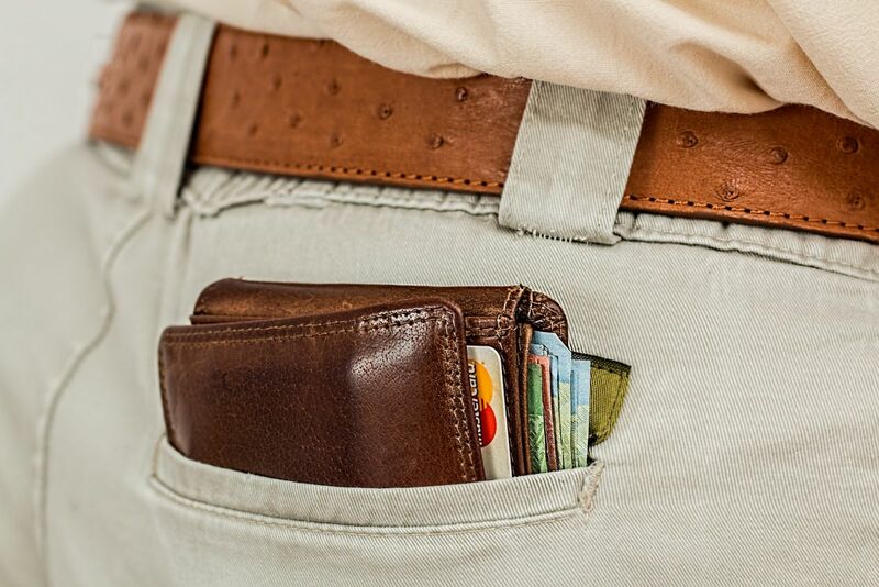 Dollars and Wallets - Wallet in Back Pocket