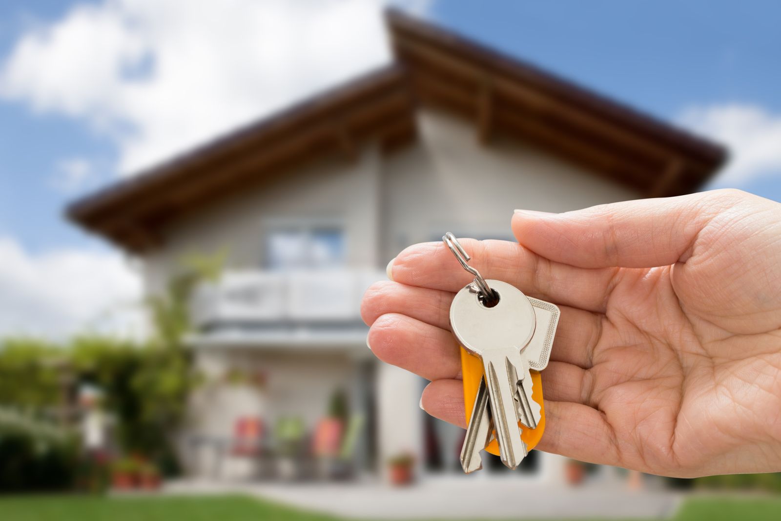 Housing and Real Estate - Getting keys to a house by AndreyPopov via iStock