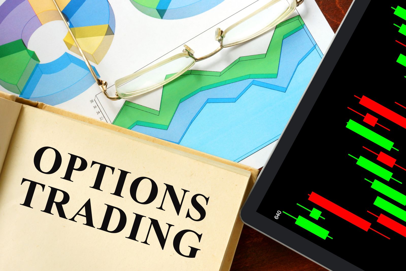 Options - Words options trading written on a book by Vitalii Vodolazskyi via Shutterstock