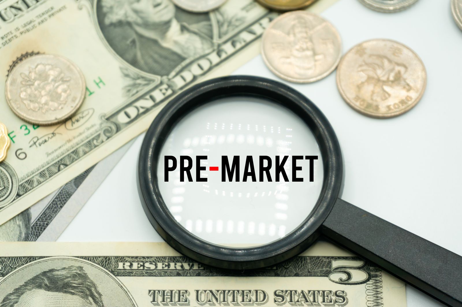 Magnifying glass showing the words Pre Market by Evan_huang via Shutterstock