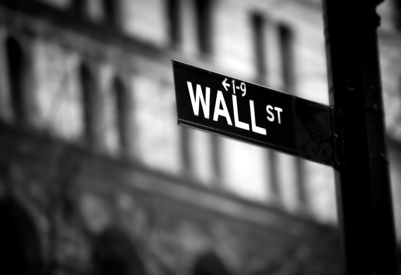 Wall Street - Wall Street sign in lower Manhattan New York by Stuart Monk via Shutterstock